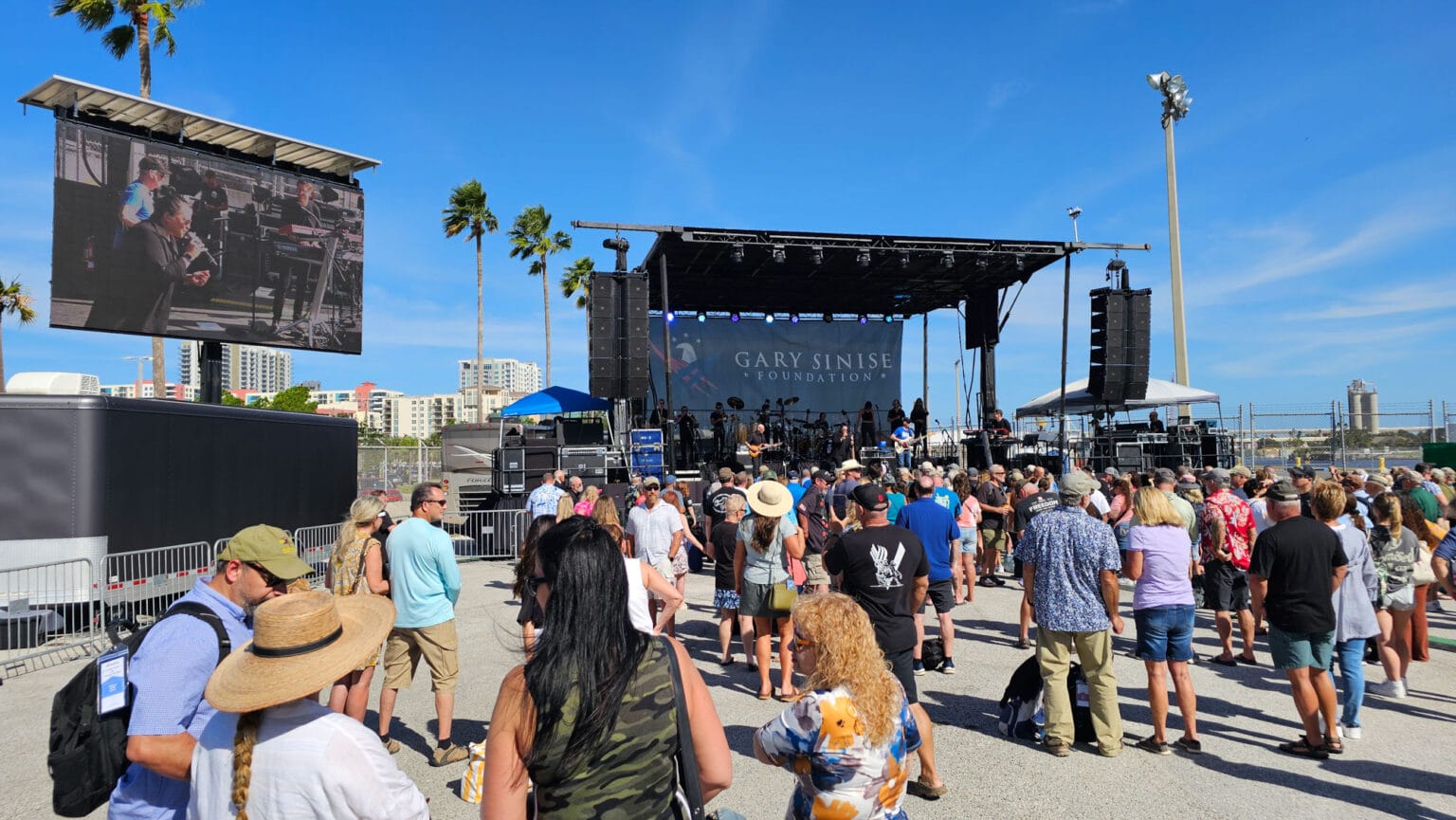 Crowd at outdoor Gary Sinise Foundation concert stage