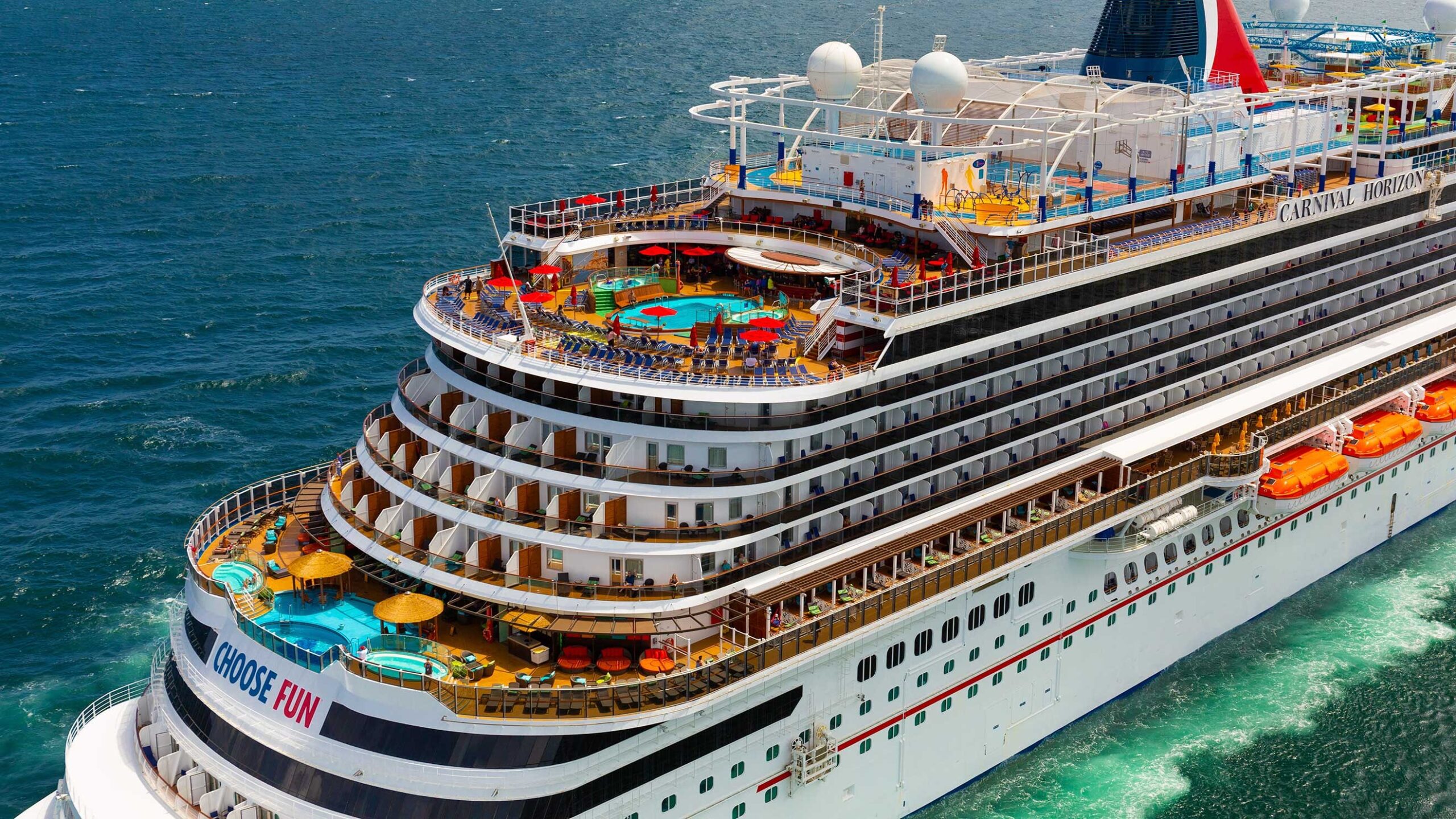 Carnival cruise ship with pools sailing at sea